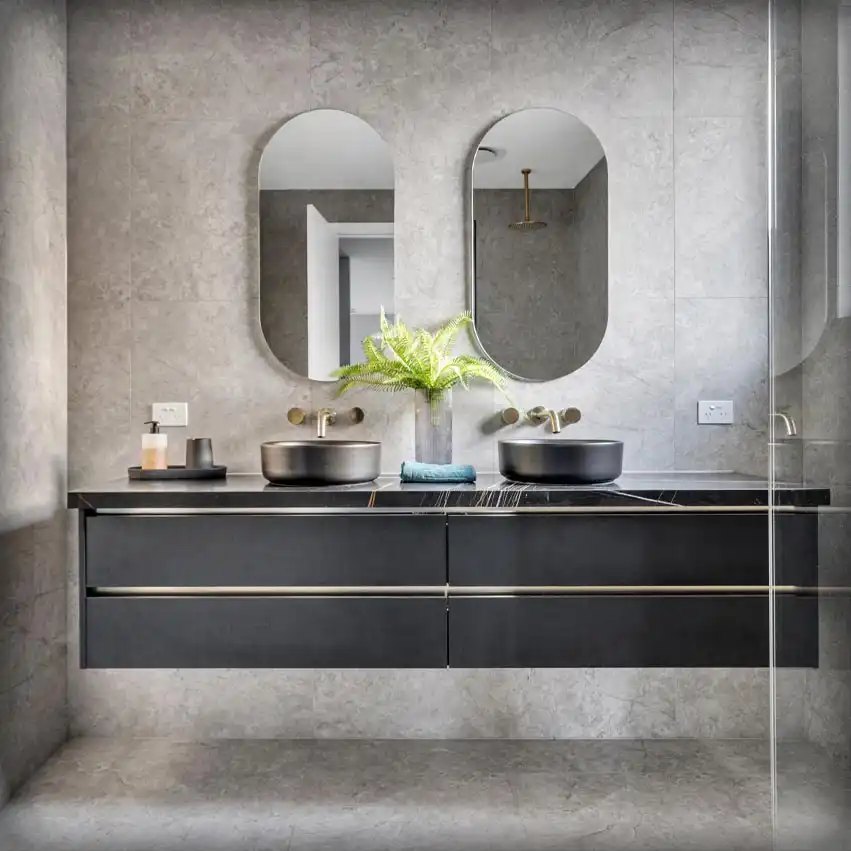 Rescom Complete bathroom with double vanity and oval mirrors